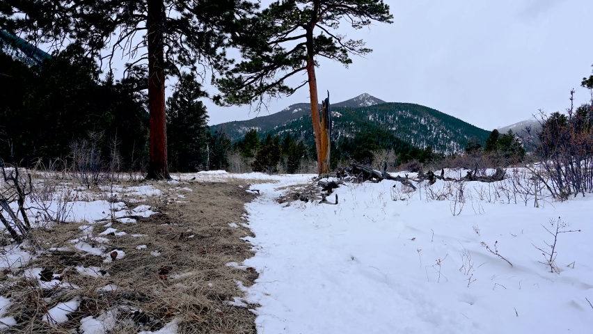 Hiking Bridal Veil Falls trail in Rocky Mountain National Park in the Winter