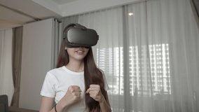 young woman boxing workout by use virtual reality device at home