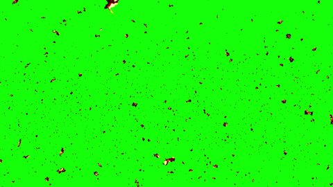 Burning ash flies towards camera on green screen (4K,ultra high definition 2160p)