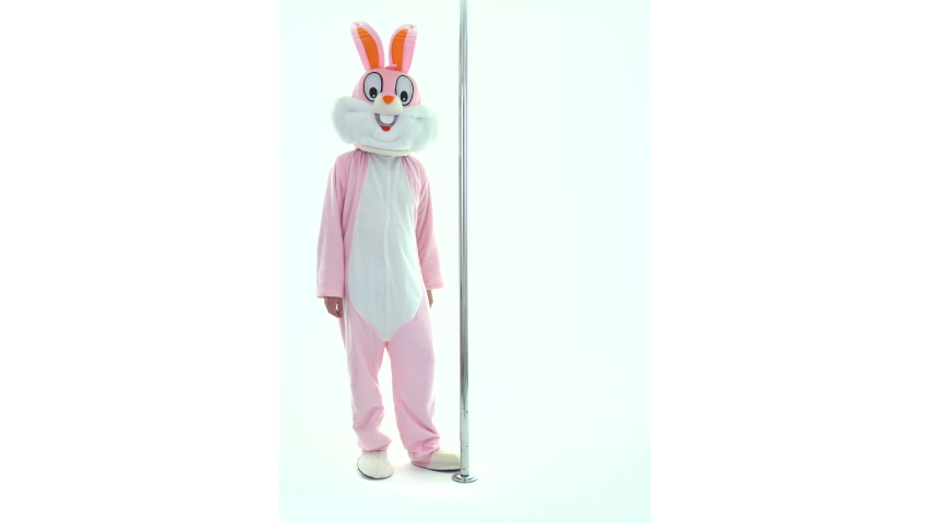 Stripper or strip dancer dances striptease on pole. Man or woman is dancing and stripping spinning rotates on pole, isolated on white