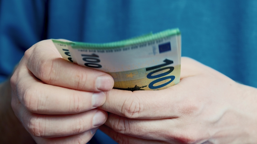 Close up man hands while counting euro money bills european economy value. Euro currency exchange. Cash money calculation. Businessman counting euro banknotes. | Shutterstock HD Video #1068230960