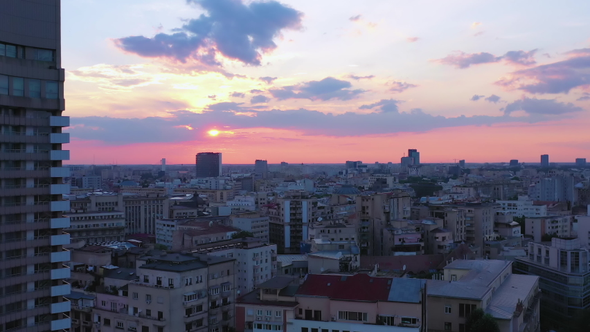 Beautiful aerial view of urban city centre skyline with pink sunset, Bucharest | Shutterstock HD Video #1068237074