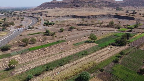 Aerial footage of dry landscape on the outskirts of Pune India.