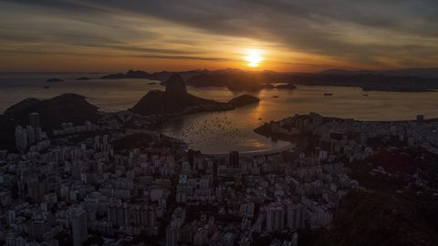 sunset sky flight over rio de janeiro city bay aerial panorama 4k timelapse brasil