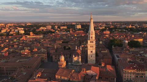 aerial view of modena cathedral and city center at sunrise,cityscape drone shot at dawn