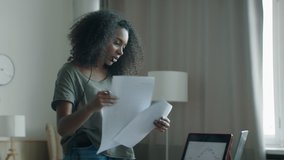MED Black African American female working from home, having a phone call with client or office. WFH, stay home, COVID-19 coronavirus pandemic new normal concept - Powered by Shutterstock - Get 15% off with code: PIKWIZARD15