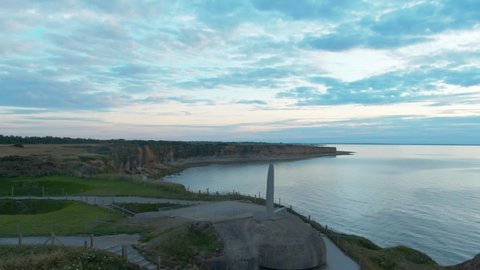 Ariel shot over Pointe du Hoc Ranger Monument, Normandy during sunset