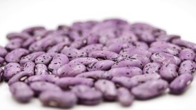 Bean close-up. Grains in spots. Studio shooting. Close-up. On a white background.4k. HD