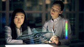 Woman Engineers designs full electric aircraft using futuristic programs and holographic projection. Concept of: drone, Machine learning, future, project and augmented reality - Powered by Shutterstock - Get 15% off with code: PIKWIZARD15