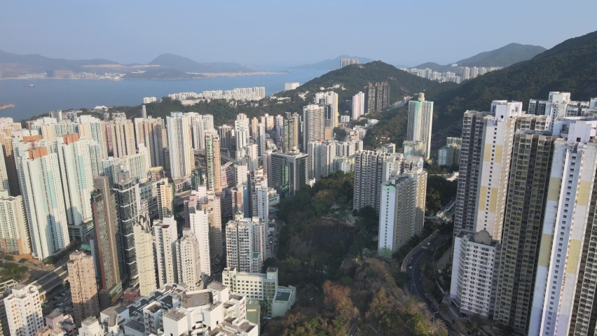 Aerial View of the skyline of Hong Kong East at Victoria Harbour, Kings Road in Tai Koo Shing and Quarry Bay District