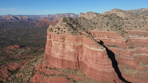 Aerial view on Courthouse Butte revealing Sedona valley, USA on sunny summer day
