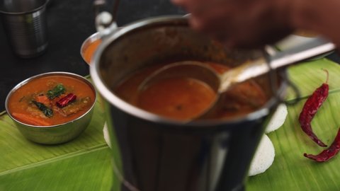 Many Idli or idly sambar with coconut chutney , tomato chutney popular breakfast vegetarian food in South Indian restaurant 