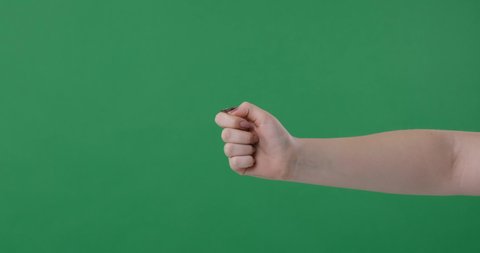 Hand gestures coin flip on green screen
