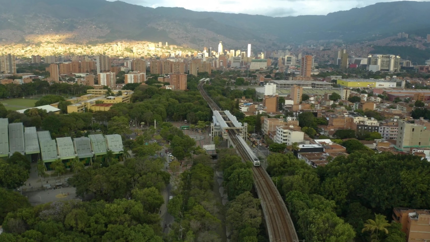Subway Metro Train Enters Station in Medellin, Colombia Neighborhood