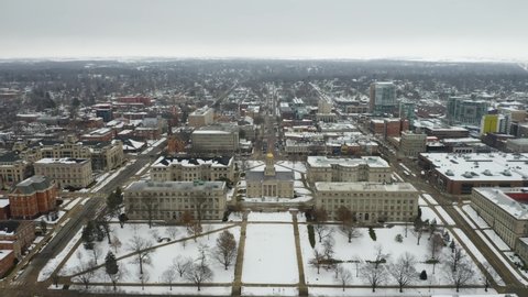 Iowa City , Iowa , United States - 01 16 2021: Aerial View of Old Capitol Museum at The University of Iowa. Backwards. Winter