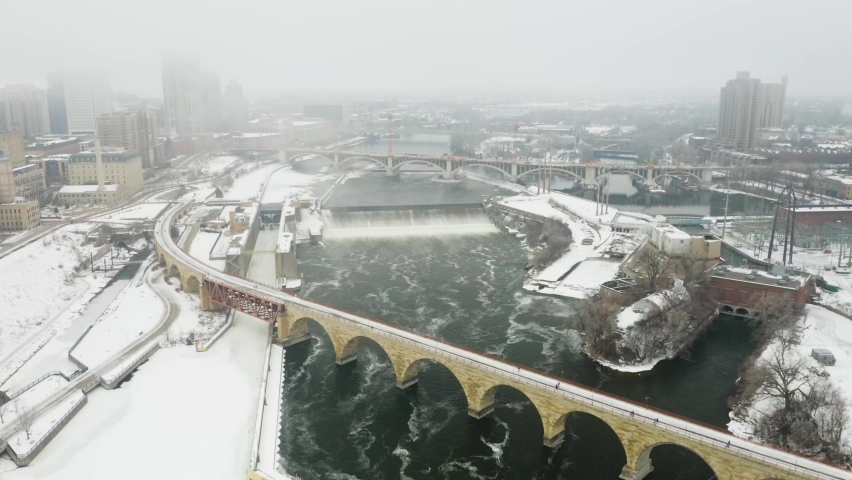 Drone View of Minneapolis Stone Arch Bridge and Saint Anthony Falls. Winter