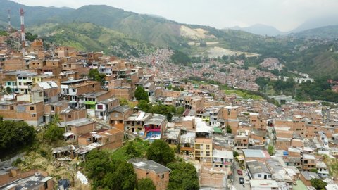 Aerial View of Comuna 13 Neighborhood in Medellin, Colombia on Cloudy Day.