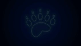 Glowing neon line Bear paw footprint icon isolated on black background. 4K Video motion graphic animation.