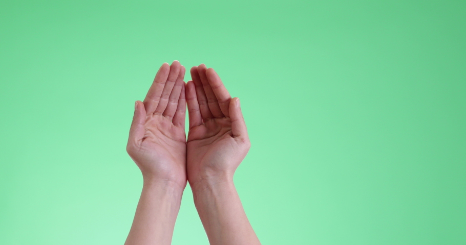 woman hands praying on chroma key background Royalty-Free Stock Footage #1068400244