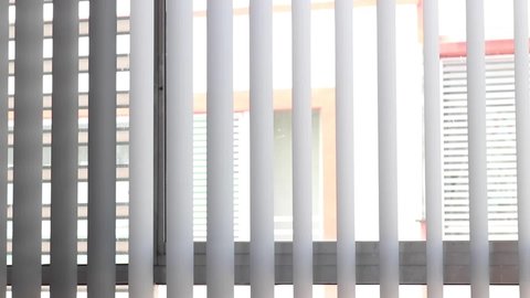 custom vertical blinds closing on window - medium