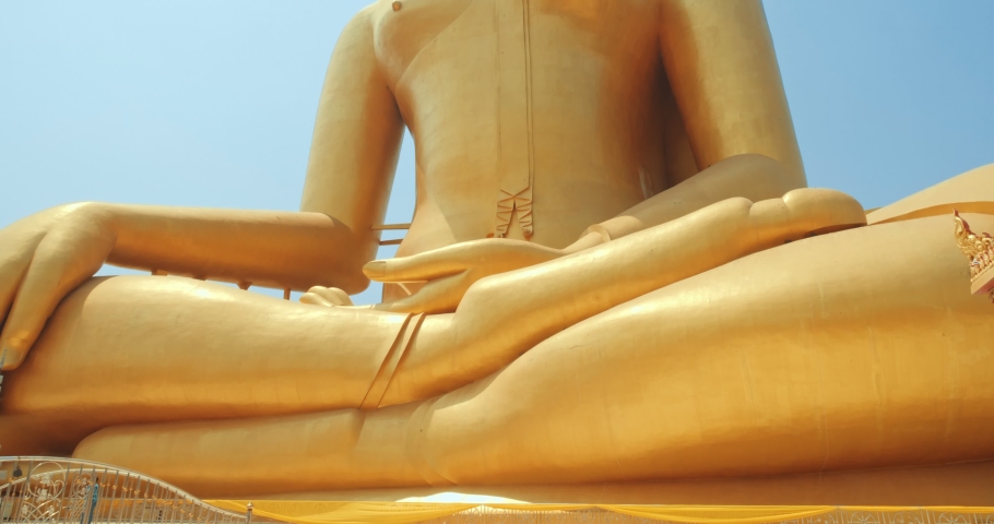 Big buddha statue The glittering golden color is beautiful. Wat Muang, Ang Thong Province, Thailand