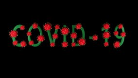 3d video animation green text covid-19 with red molecules of covid-19 on it on black background. Coronavirus concept. Idea of pandemic, epidemic. Digital writing, title, inscription.