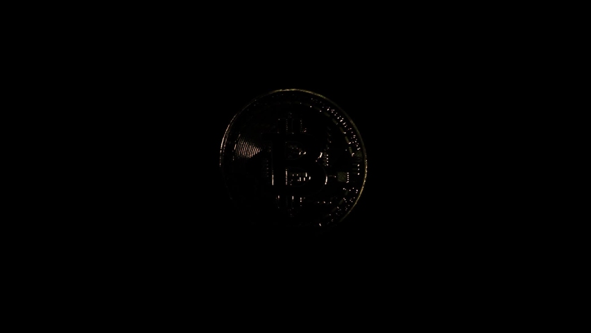 bitcoin on black background crypto coin, a Business & Finance Video by Dmytro Lvov