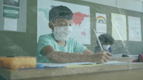 Animation of mathematical formulae over schoolboy in face mask writing at school. global covid 19 pandemic, education and learning concept digitally generated video. - Powered by Shutterstock - Get 15% off with code: PIKWIZARD15