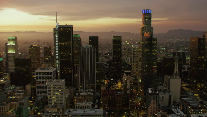 Aerial view of Los Angeles with financial charts and data. Futuristic city skyline. Big data, Artificial intelligence, Internet of things, AR. Stock exchange figures. Royalty-Free Stock Footage #1068460535
