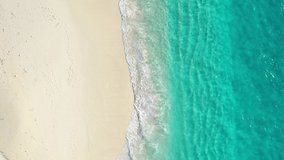 Aerial view on a seashore with clear water