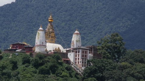 Religious Complex Atop a Hill in the Kathmandu Valley, Swayambhunath Hindu Stup with Golden Top and Prayer Flag in Nepal