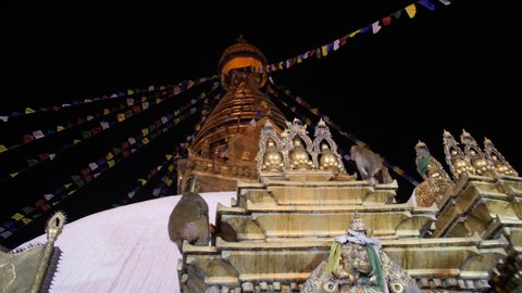 Kahtmandu Valley Swayambhunath HIndu Stupa Temple with Climbing Monkeys and Prayer Flags at Night, Nepal