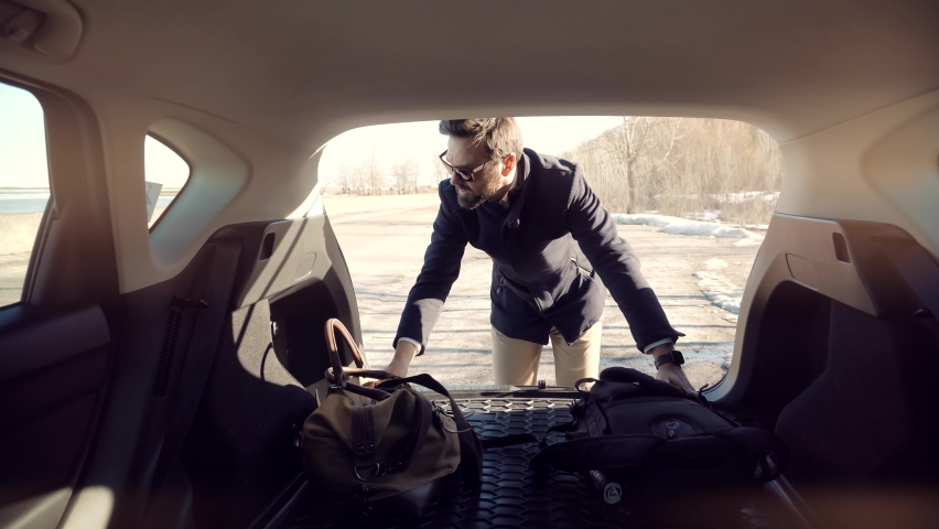Businessman Open Car Trunk Before Business Journey. Preparing To Family Vacation Trip.Inside On Car Trunk View.Holiday Vacation Travelling.Man Puts Bags In Trunk Car.Stores Bags On Car Business Travel | Shutterstock HD Video #1068482645