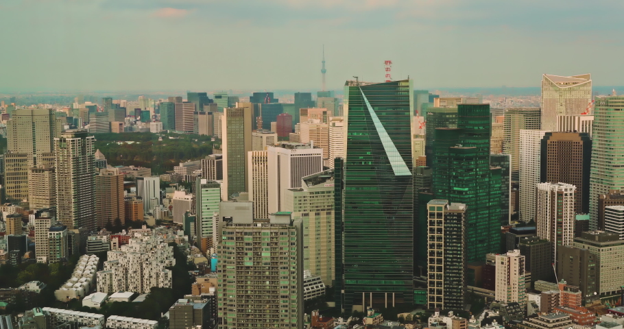 Panning right of Tokyo cityscape at dawn, Japan