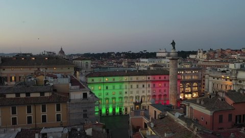 at night, Palazzo Chigi in Rome, seat of the Italian government. The tricolor of the Italian flag illuminates the facade. Center city of Roma, Italy.