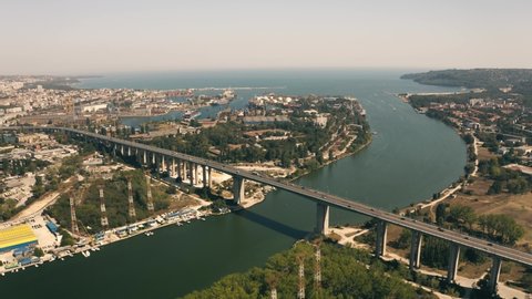 Aerial view Bridge Main Road traffic Cars Moving. Seaside town Varna City Bulgaria Summer at Midday