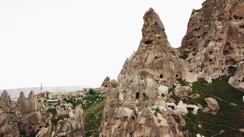 ancient stone dwellings carved from tuff in Cappadocia turkey