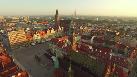 Aerial dynamic footage of Wroclaw, European Capital of Culture 2016 and World Games 2017 in Poland. Center Town Hall, Market Square, Sky Tower, st. Elisabeth Church, City panoramic view. Traveling EU.