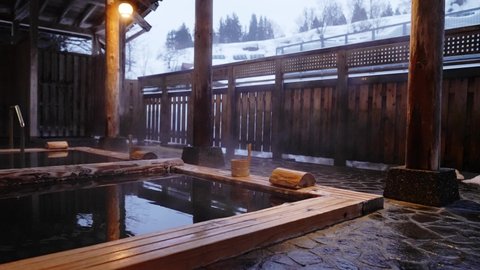 Japanese open air hot spring concept. Tourism of Japan.