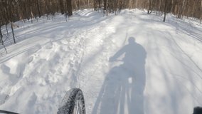 Mountain biking POV in winter action footage - Powered by Shutterstock - Get 15% off with code: PIKWIZARD15