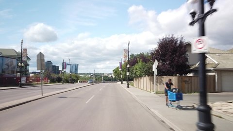 SASKATOON, CANADA - AUGUST 2019: Cinematic Gimbal Driving Across Brige in Saskatoon During Summer Day