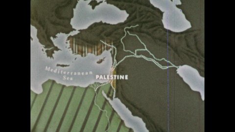 1960s: Map of Palestine, the Mediterranean Sea, Egypt, Assyria, and Babylonia. Caves in rock cliff wall.