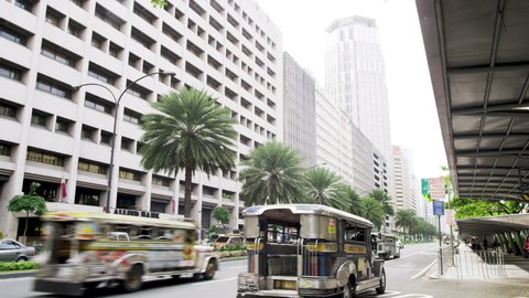 MANILA, PHILIPPINES - MARCH 9, 2013: Traffic along Ayala Avenue, Makati