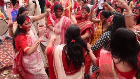 Sindoor Khela or sindur play - Indian Bengali Women Dance during Vijaya Dashami in Durga Puja Festival. A ritual to bid farewell to Goddess Durga. 
Delhi - India 
10th Oct 2019 