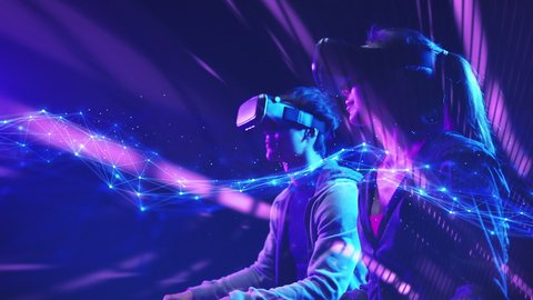 Teenager having fun play VR virtual reality glasses sport game 3D cyber space futuristic neon colorful background, Metaverse future digital technology game and entertainment