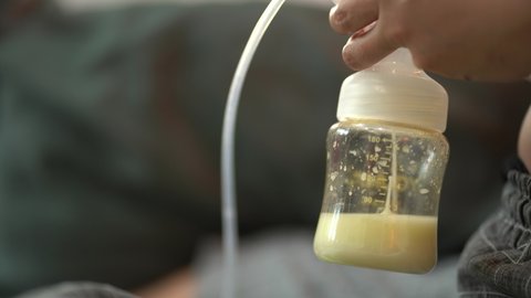 Mother was pumping breast milk for the baby to eat, the breast pump to keep for the baby.
