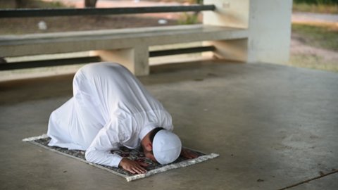 Asian islam man prayer,Young Muslim praying,Ramadan festival concept