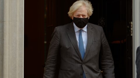 LONDON, CIRCA 2021 - Boris Johnson leaves Downing Street ahead of Prime Ministers Questions in Parliament