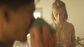 Young Couple In The Kitchen. Woman Shows Her Husband Positive Pregnancy Test. They Hug And Rejoice. - Powered by Shutterstock - Get 15% off with code: PIKWIZARD15