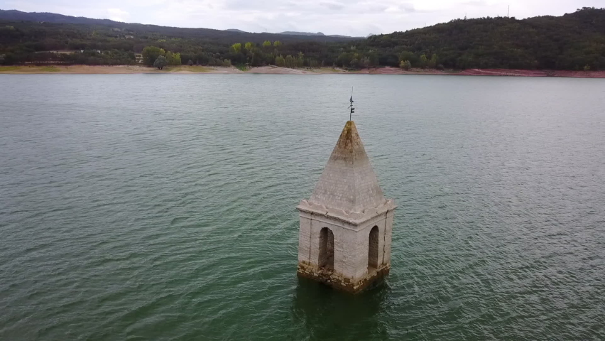 Aerial Panning: Church Tower At Sau Reservoir Near Mountains